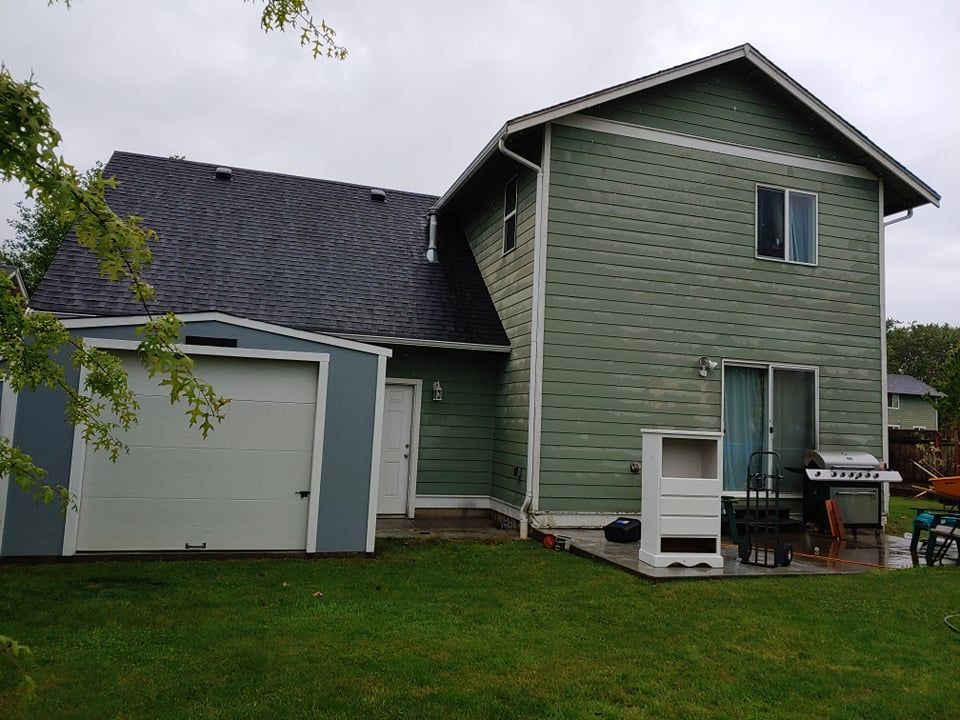 Unrenovated exterior of Bellingham, WA house.