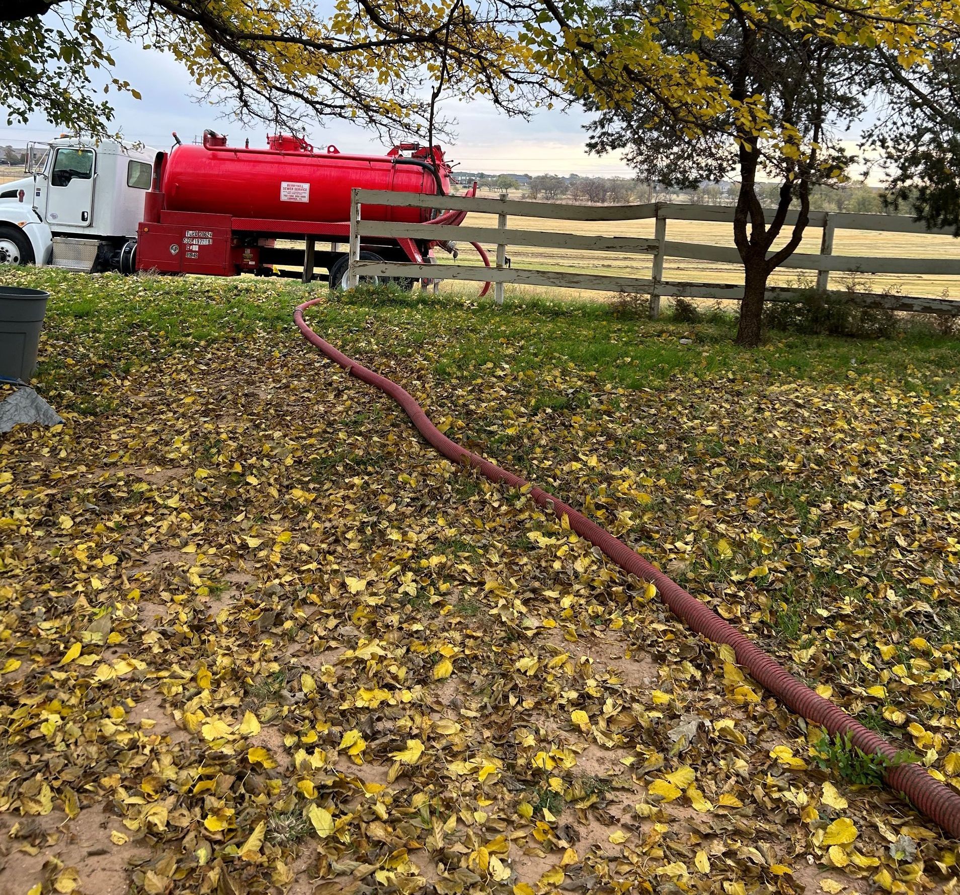 A Hose is Coming Out of a Hole in the Ground — Lubbock, TX — Berryhill Sewer Inc.