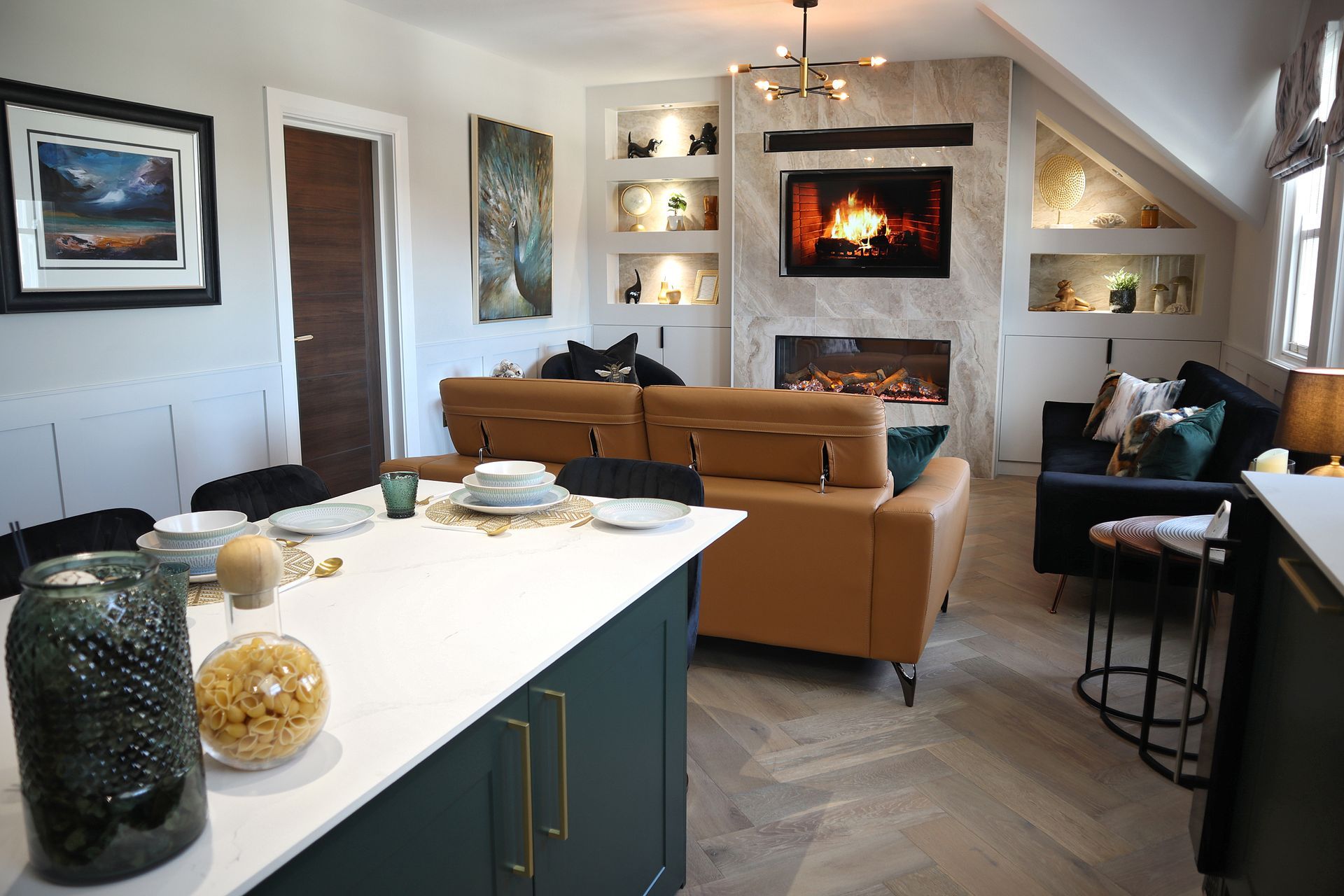 A living room with a couch and a fireplace