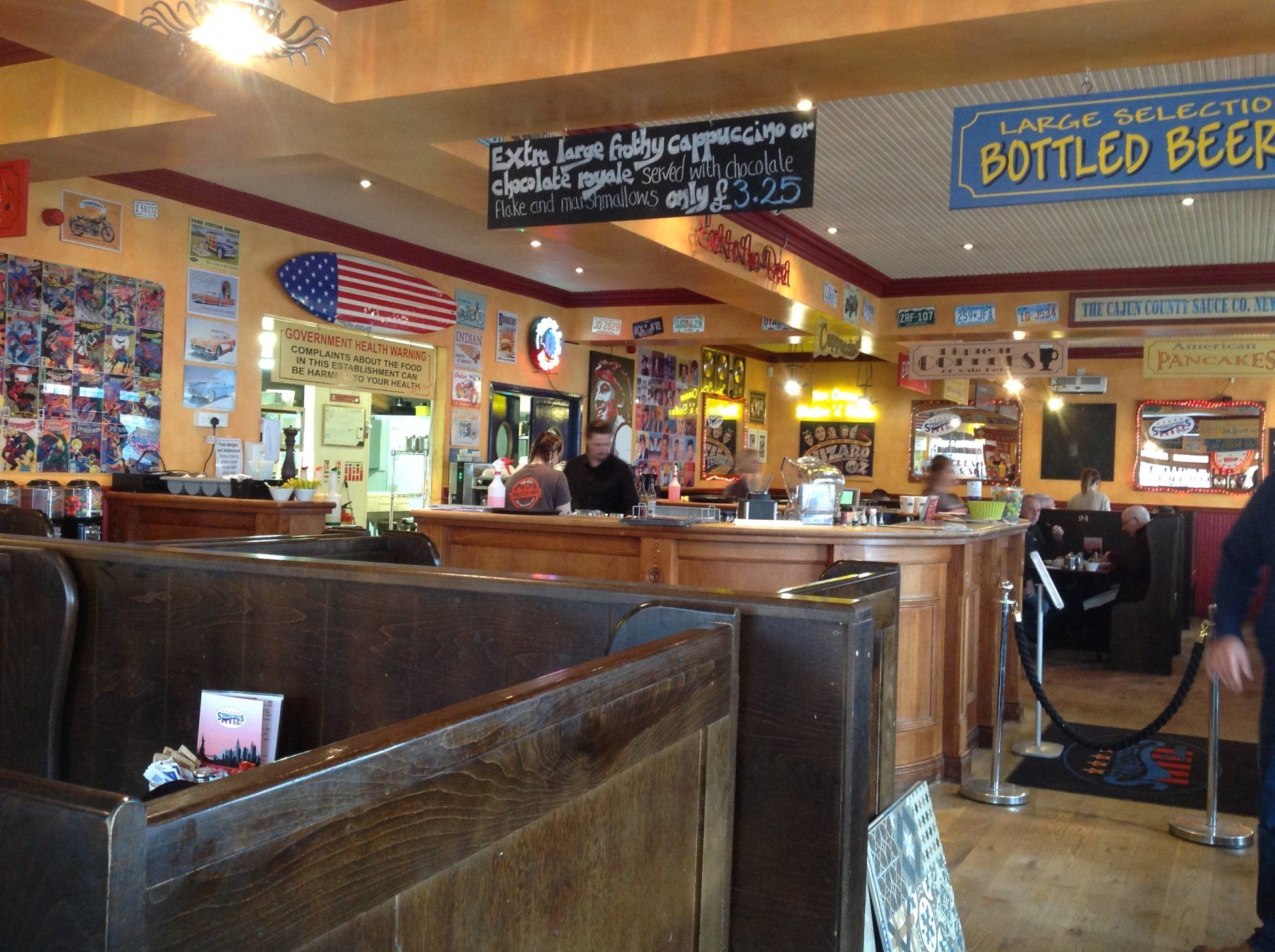 A restaurant with a sign that says bottled beer