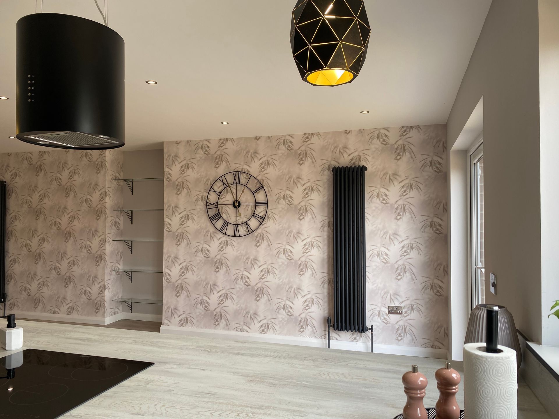 A living room with a clock on the wall