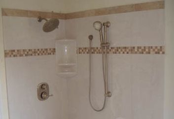 inside of a shower with shower heads 