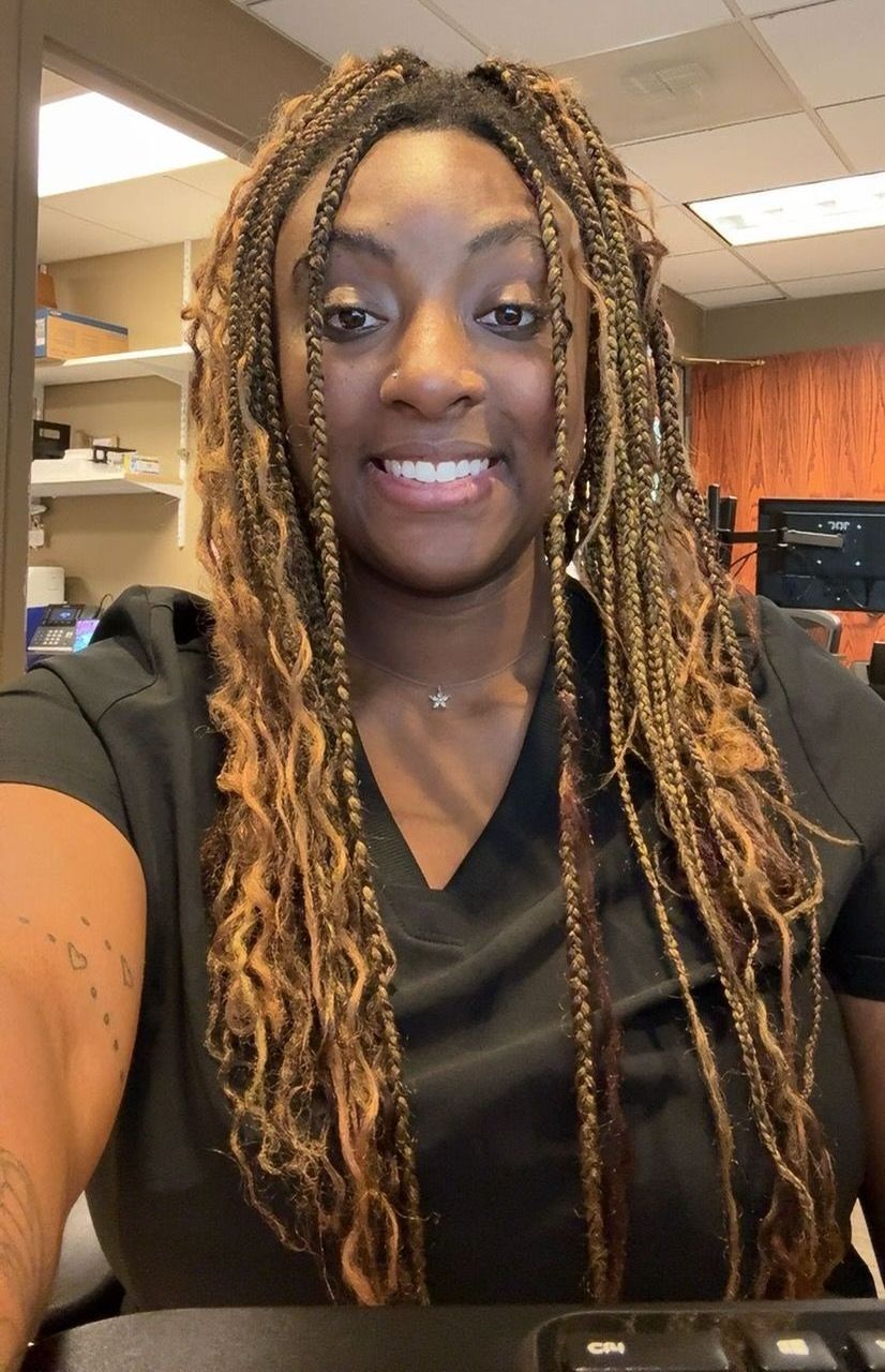 Close up headshot of Kya, an employee at Advanced Dermatologic Surgery of Overland Park, KS