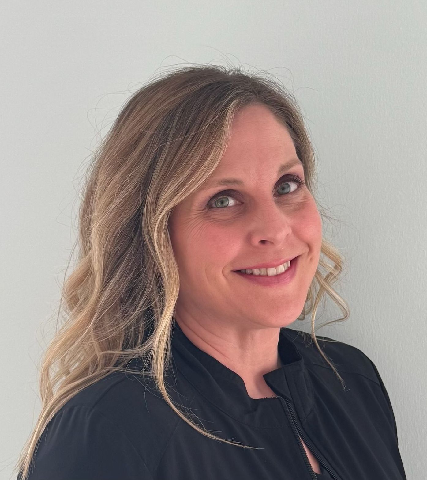 Close up headshot of Sara, an employee at Advanced Dermatologic Surgery of Overland Park, KS