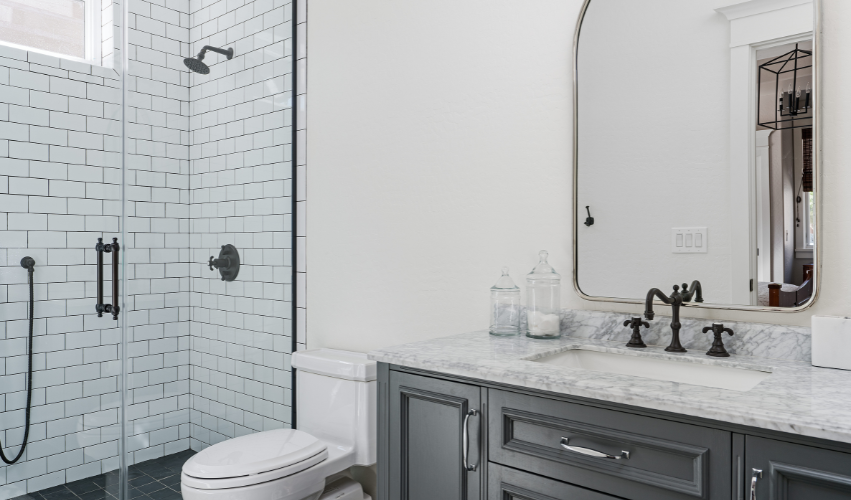 A bathroom with a bathtub , sinks , mirrors and plants.