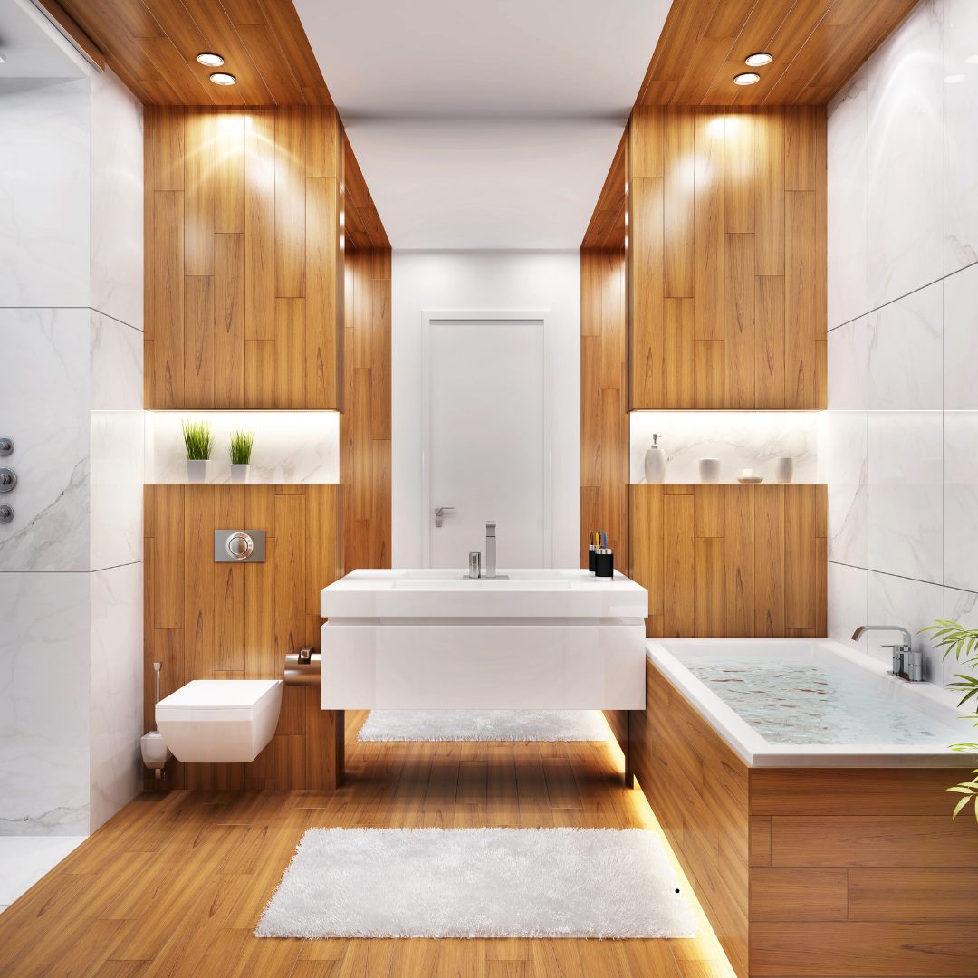 A bathroom with a toilet , sink , mirror and shower.