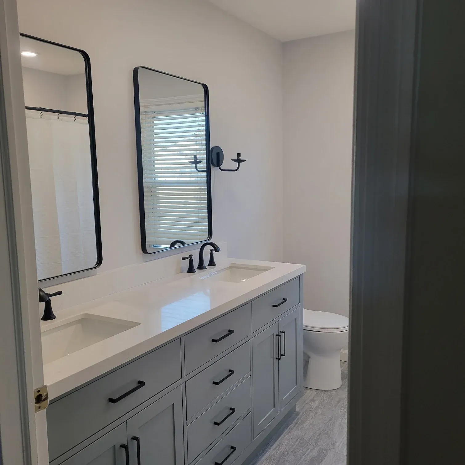 A modern bathroom with a double vanity