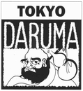 A black and white logo for tokyo daruma