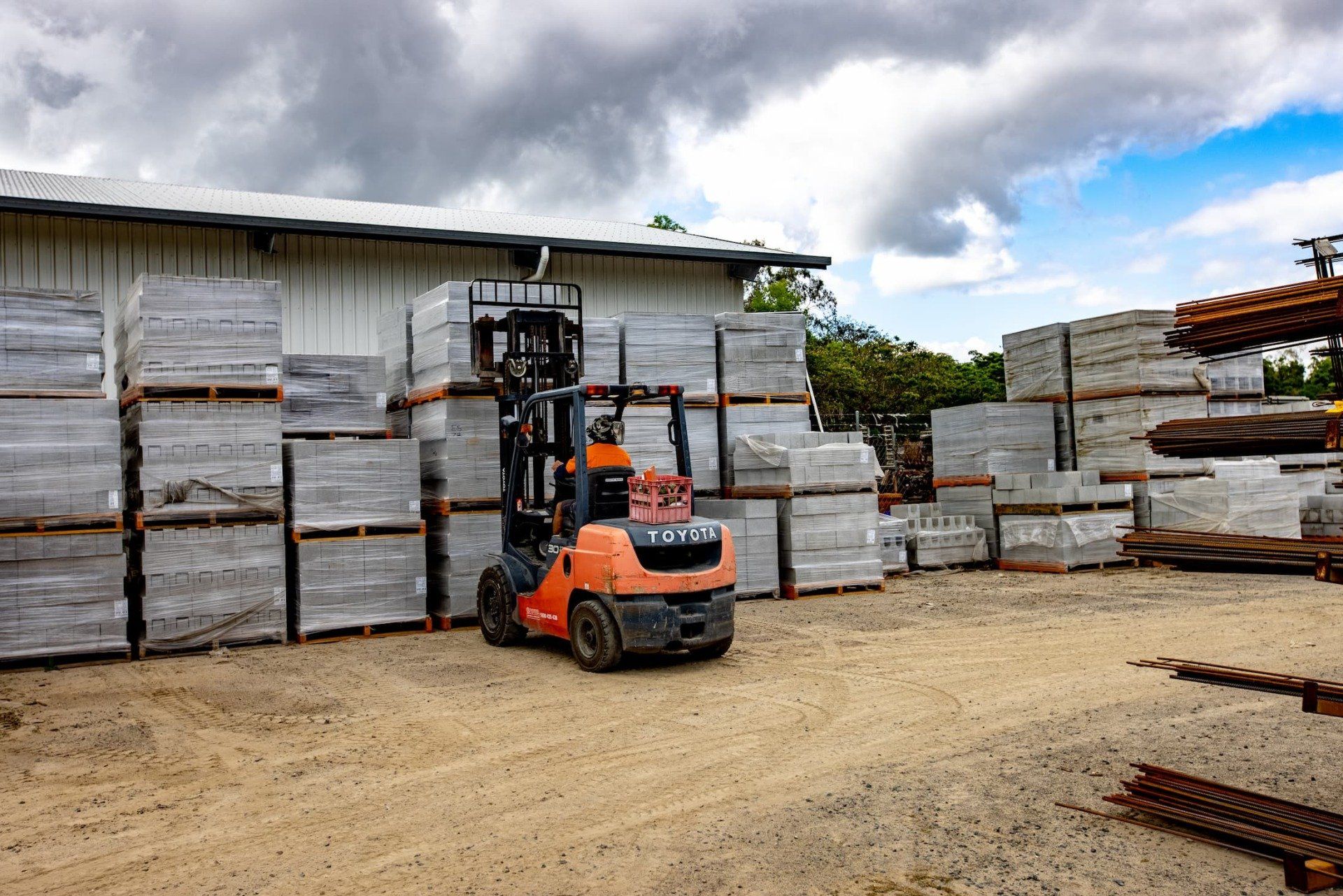 Forklift Transporting Concrete Products
