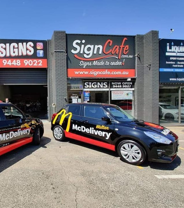 A black car with decals | Tullamarine, VIC | Sign Cafe