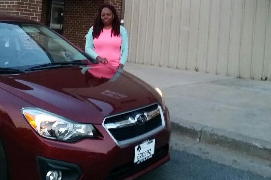 Woman Beside Car — Germantown, MD — Good Start Driving School