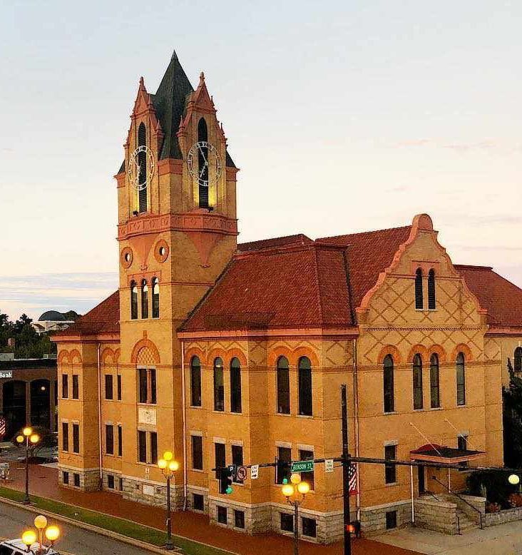 A large building with a clock tower on top of it