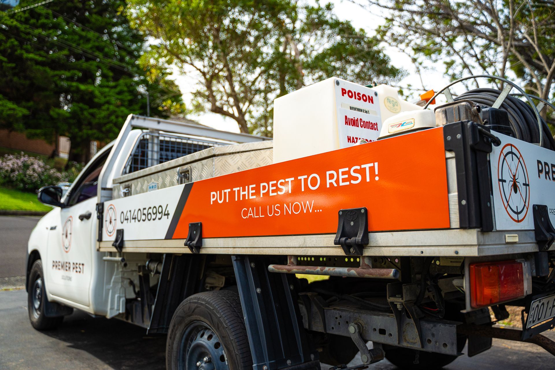 White Pest Control Truck With Orange Side Panel — Premier Pest Control Wollongong In Penrith, NSW