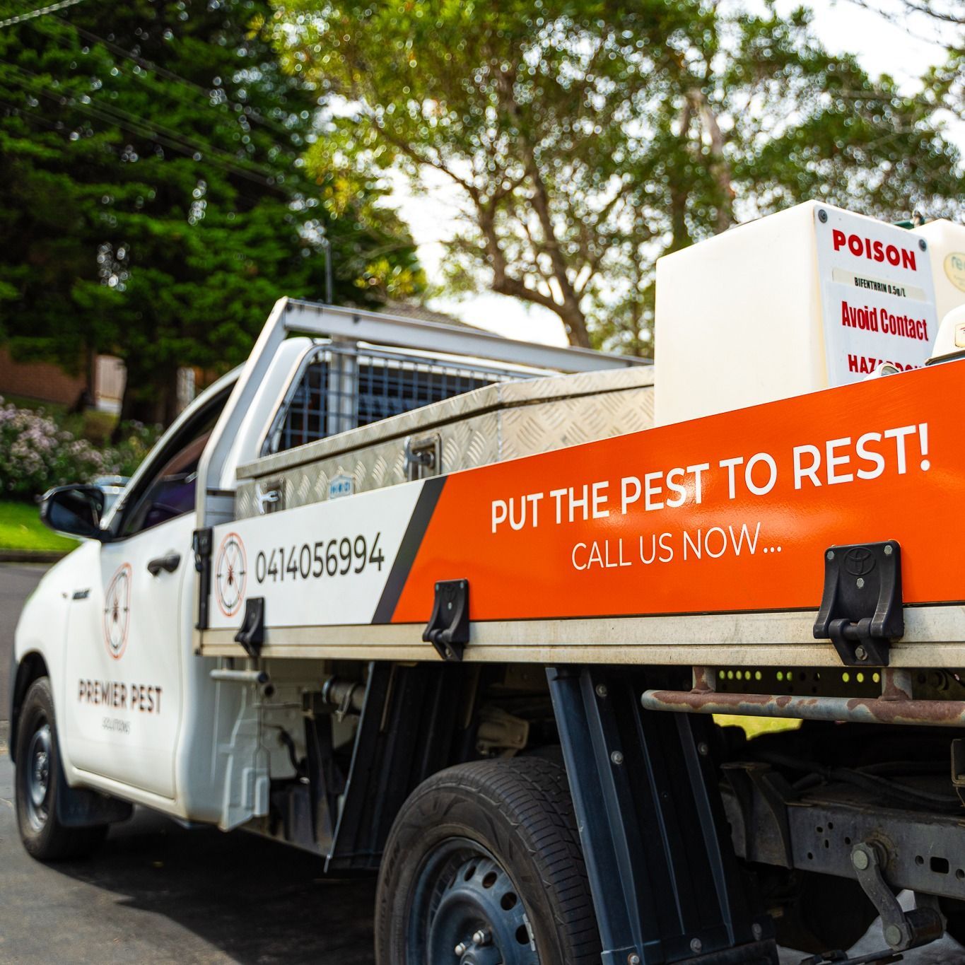 White Premier Pest Truck With Orange Trim — Premier Pest Control Wollongong In Liverpool, NSW