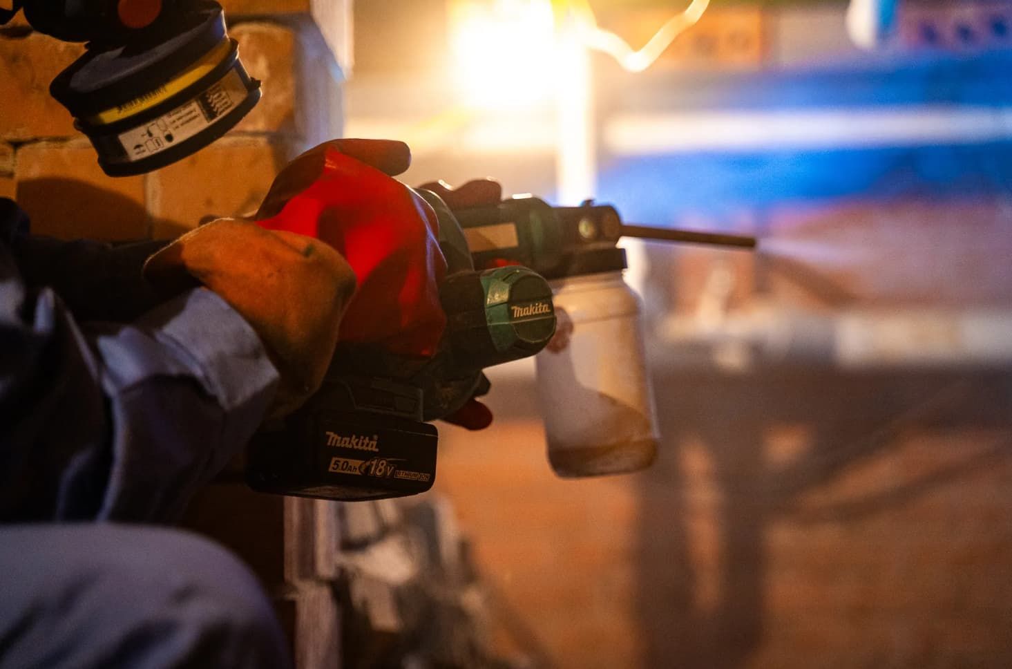 Man Spraying With Pest Control Gun — Premier Pest Control Wollongong In Wollongong, NSW