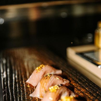 A close up of a plate of food on a grill.