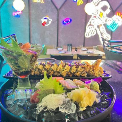 A close up of a plate of food on a table in a restaurant.