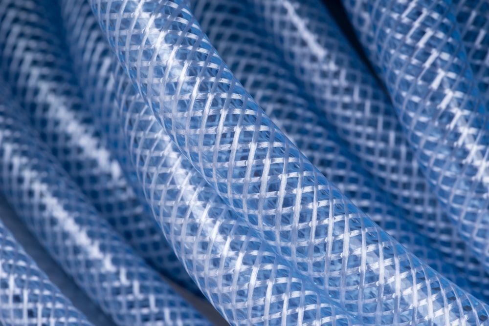 A Close Up Of A Blue And White Mesh Hose — NQPT In Garbutt, QLD