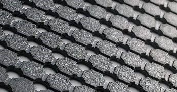 A Close Up Of A Black Mat With Holes In It — NQPT In Garbutt, QLD