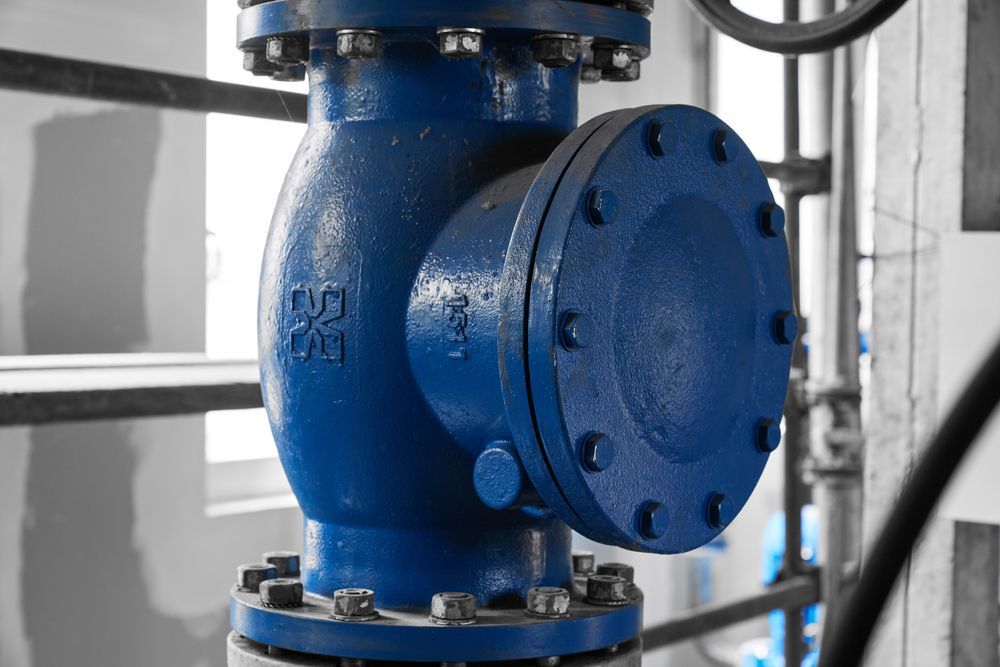 A Bunch Of Hydraulic Hoses Are Stacked On Top Of Each Other On A White Background — NQPT In Garbutt, QLD