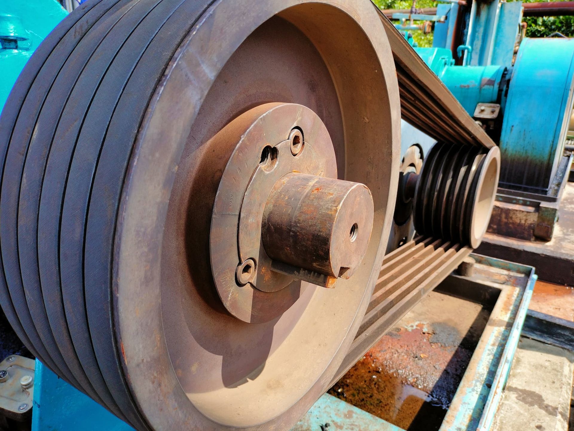 A Close Up Of A Motorcycle Engine With Belts And Pulleys — NQPT In Garbutt, QLD