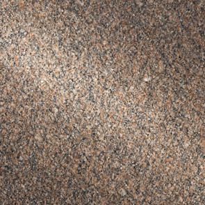 Close-up of granite surface, showing a speckled pattern in shades of brown and gray.