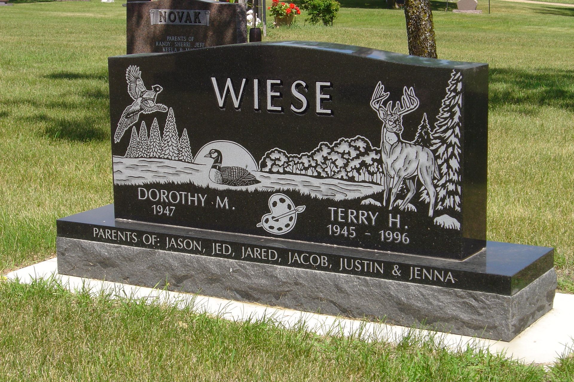 Black granite tombstone with