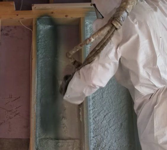 spray foam insulation contractor installing 2 inch closed cell foam