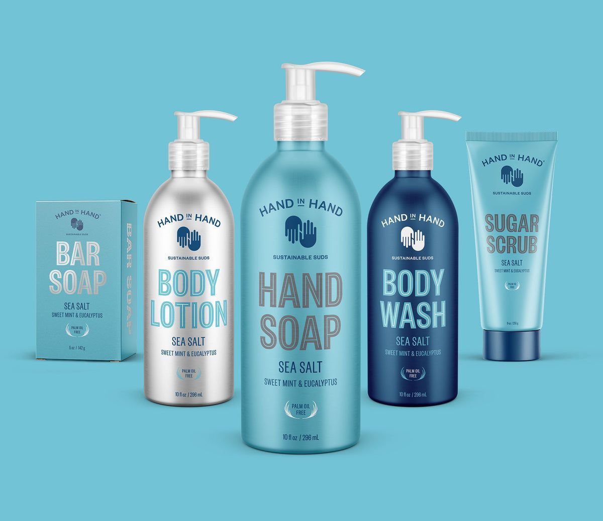 A set of bottles and boxes of soap , lotion , hand soap , body wash , and sugar scrub.