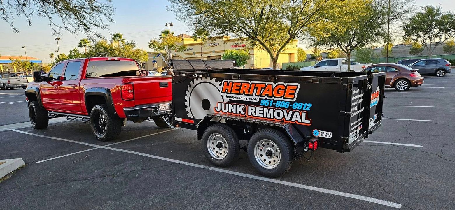 Red truck towing a trailer with 