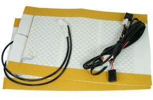 A heated seat pad with wires attached to it on a white background.