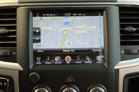 A car radio with a map on the screen.