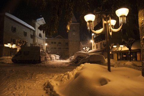 Hotel at night with snow