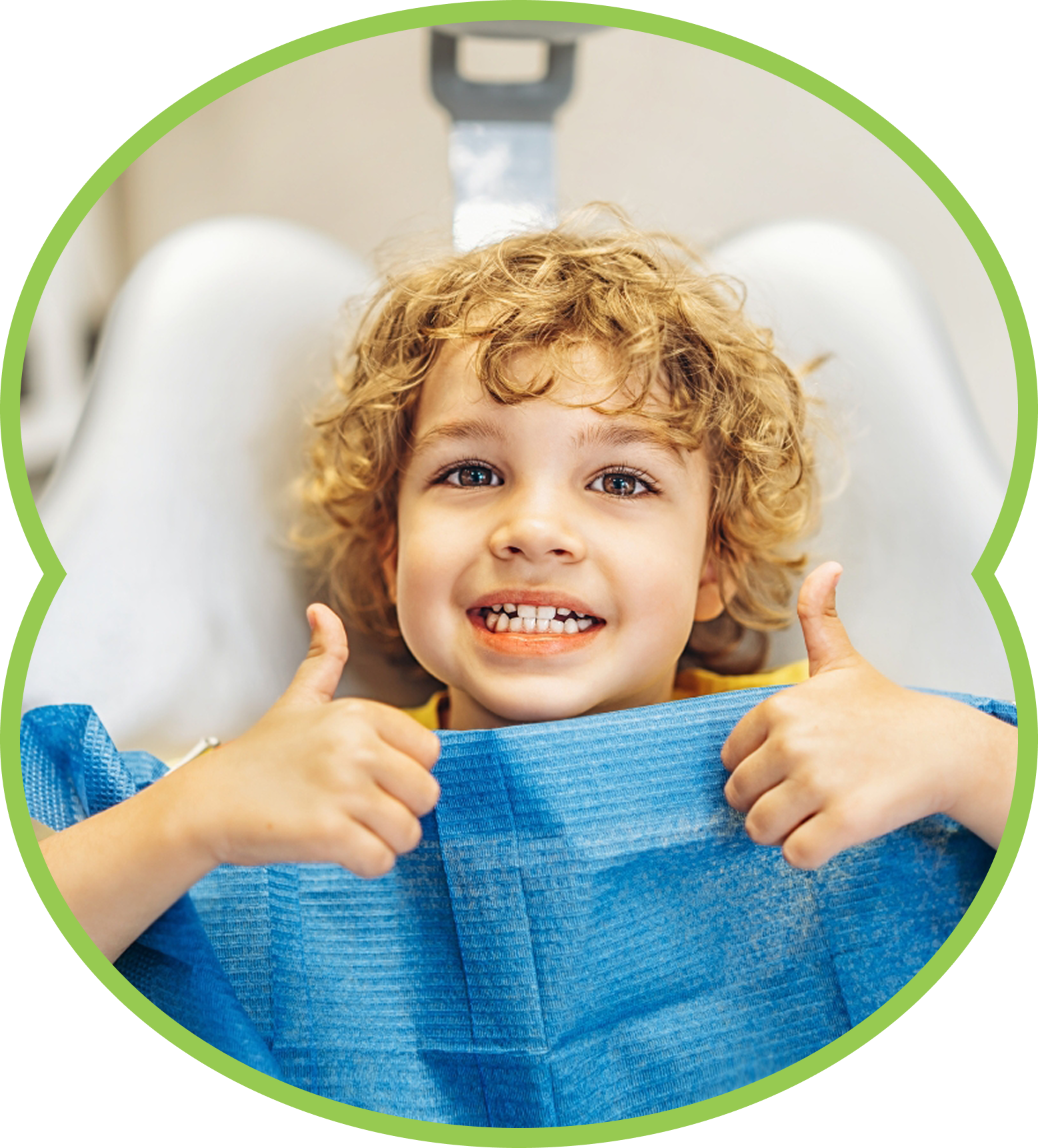 Child in a dentist's chair, mouth open, receiving dental work; blue setting.