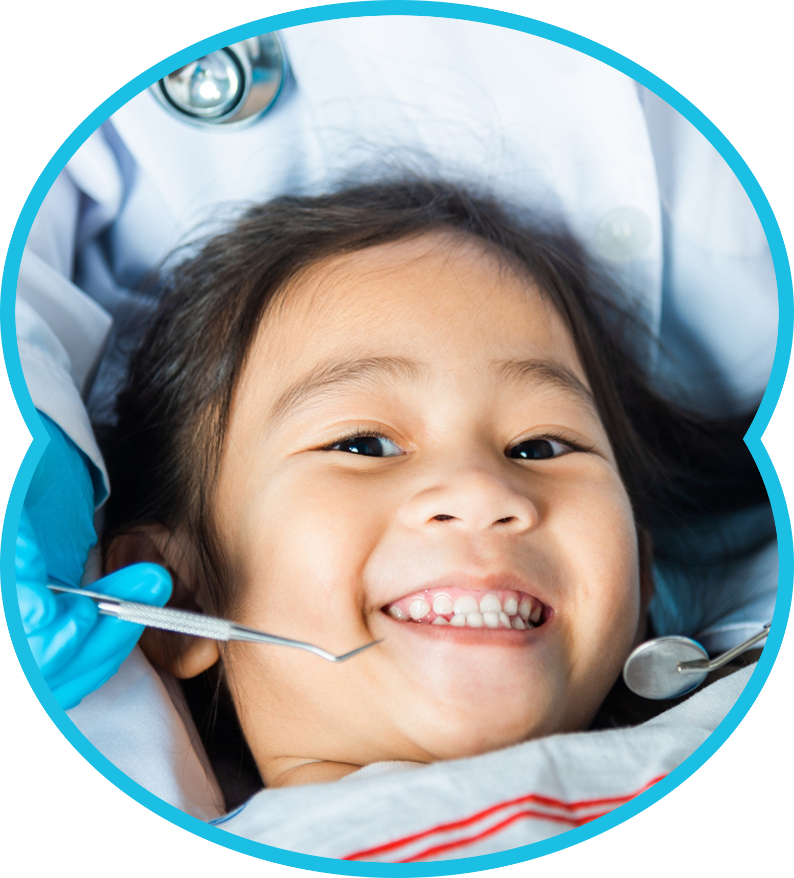 Girl at dentist, mouth open, receiving dental check-up with tools, blue gloves, white coat, close-up.