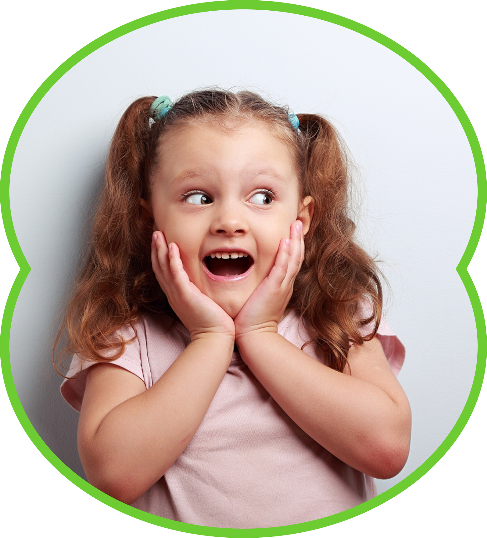 Smiling child in orange shirt in front of a brick wall, framed by a green circle.