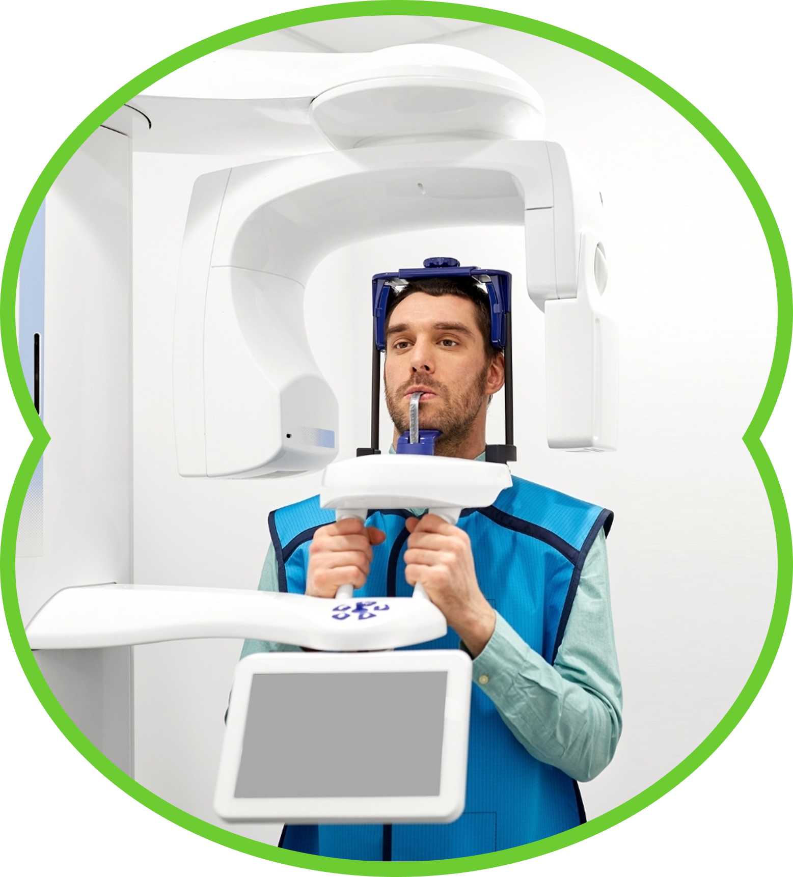 Man in dental panoramic X-ray machine, wearing protective vest.