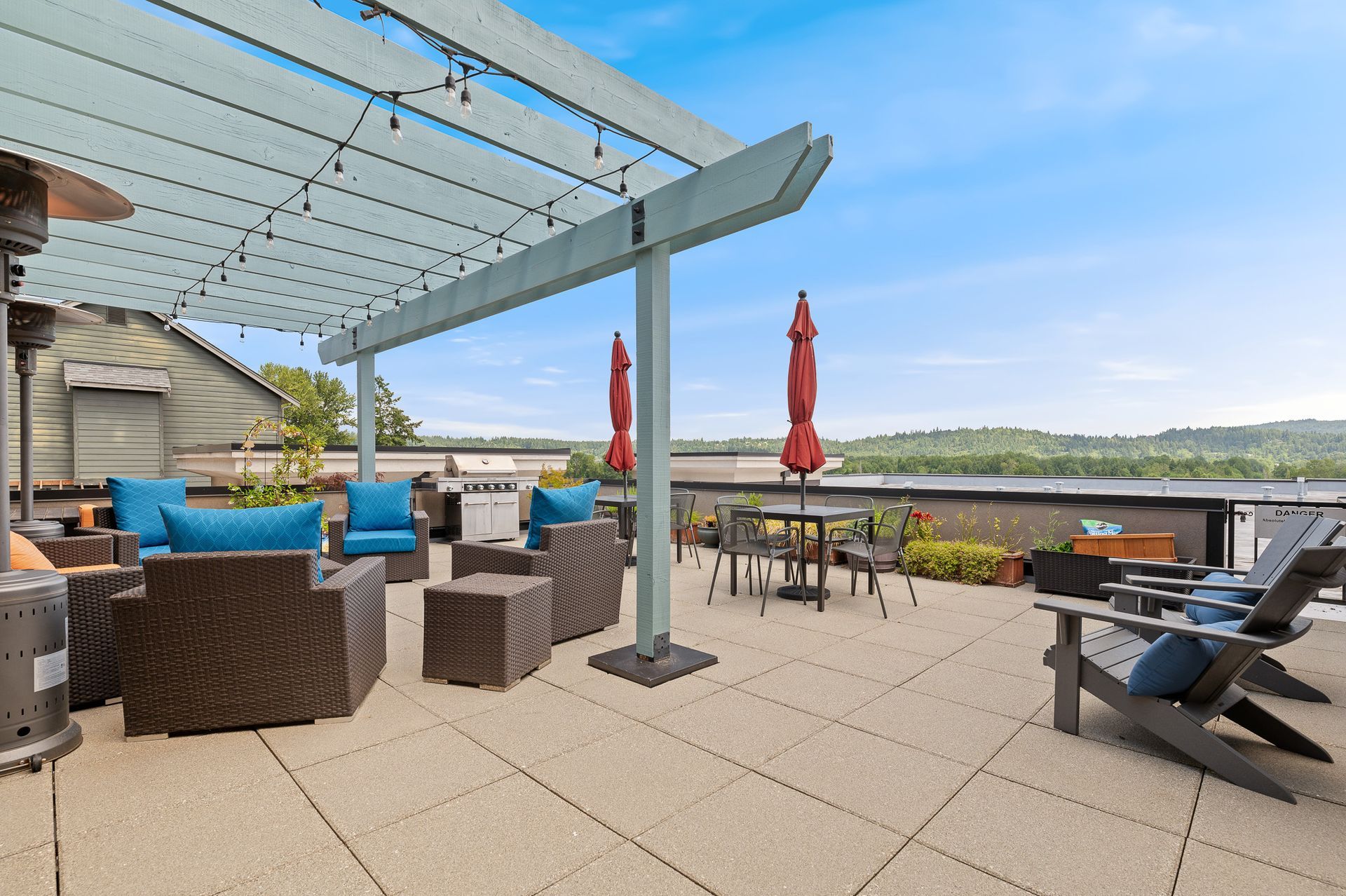 Photo of the rooftop lounge, showing the view in the background