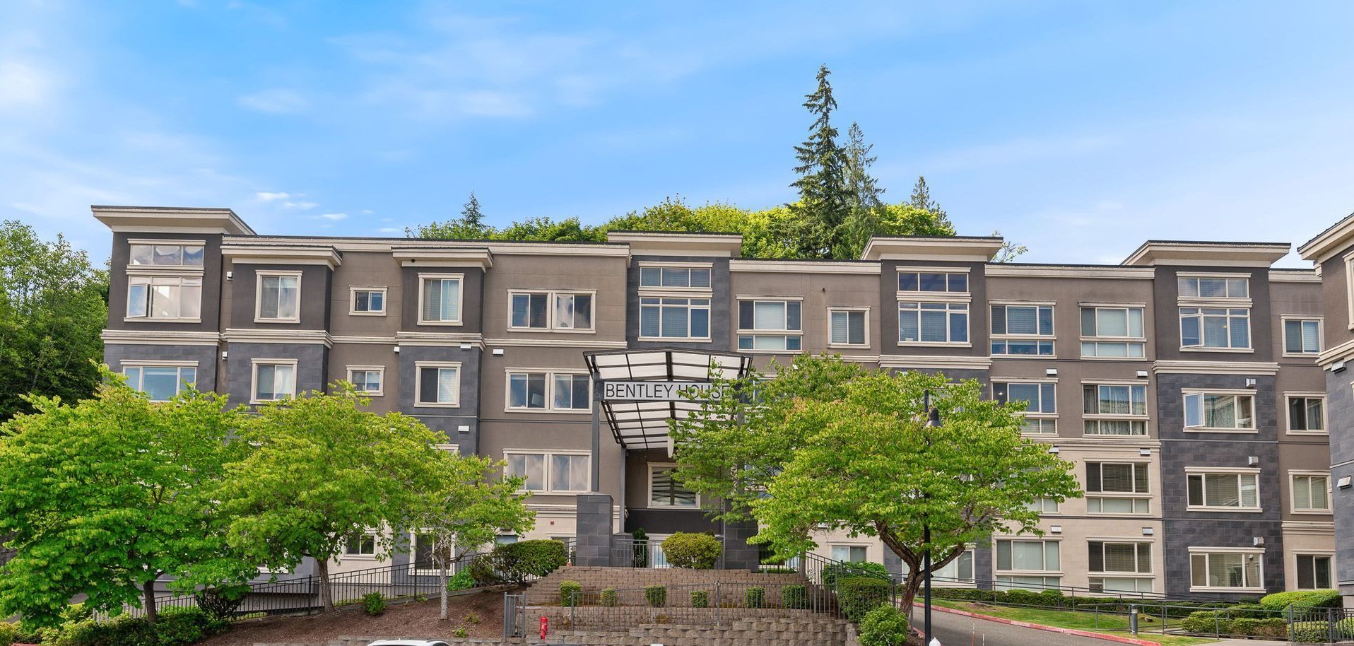 Photo of the building, seen from the parking lot
