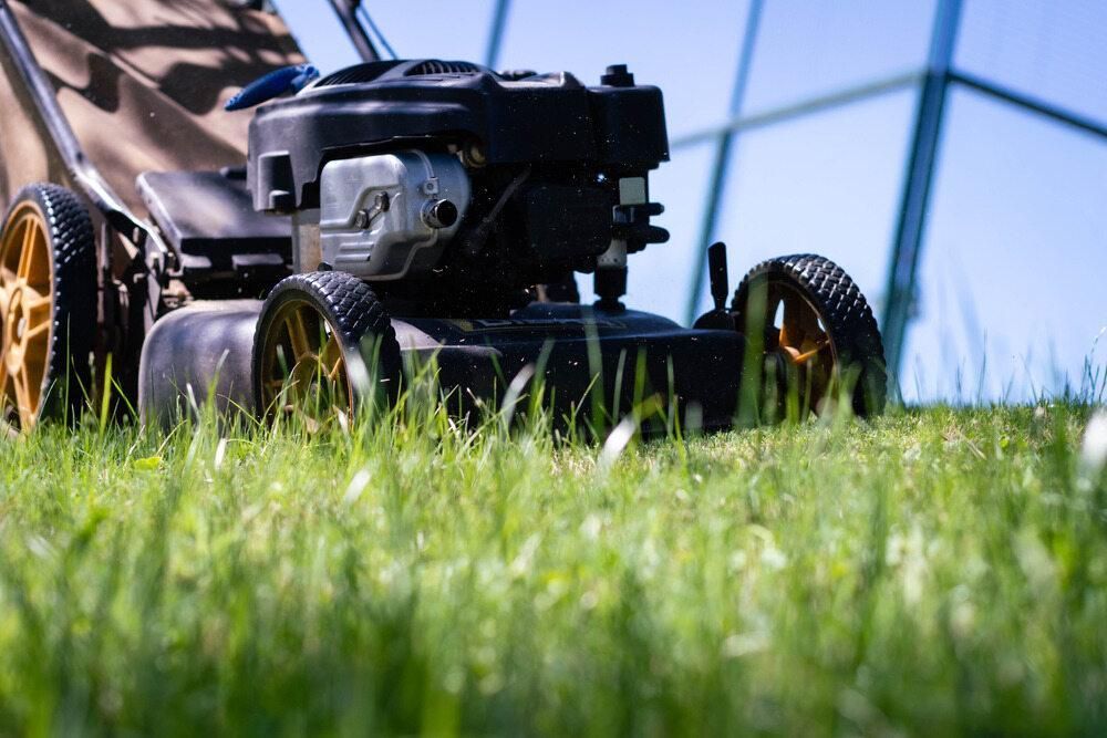 A Lawn Mower is Sitting on Top of a Lush Green Lawn — J.A. Slashing in Cairns, QLD
