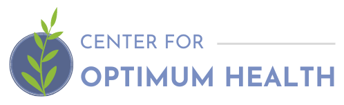 The center for optimum health logo is a blue circle with a plant in it.