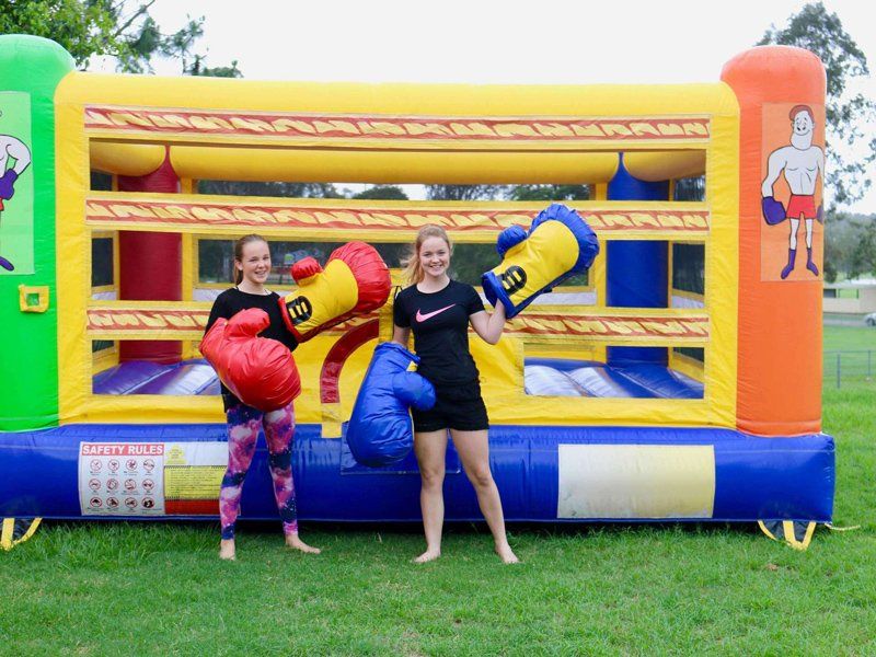 Inflatable boxing gloves — Inflatable Activities in Gympie, QLD