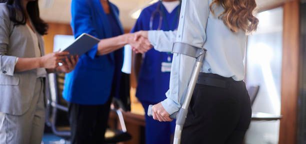Assessment of a workplace injury by medical and legal professionals.