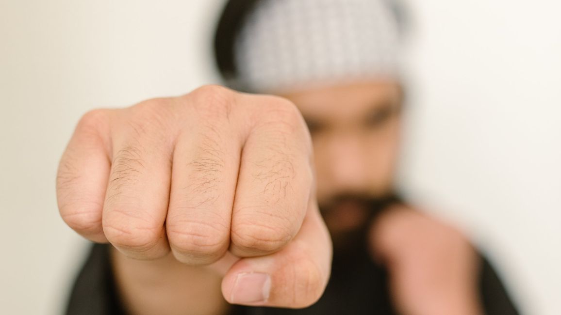 self defense fist punch at camera