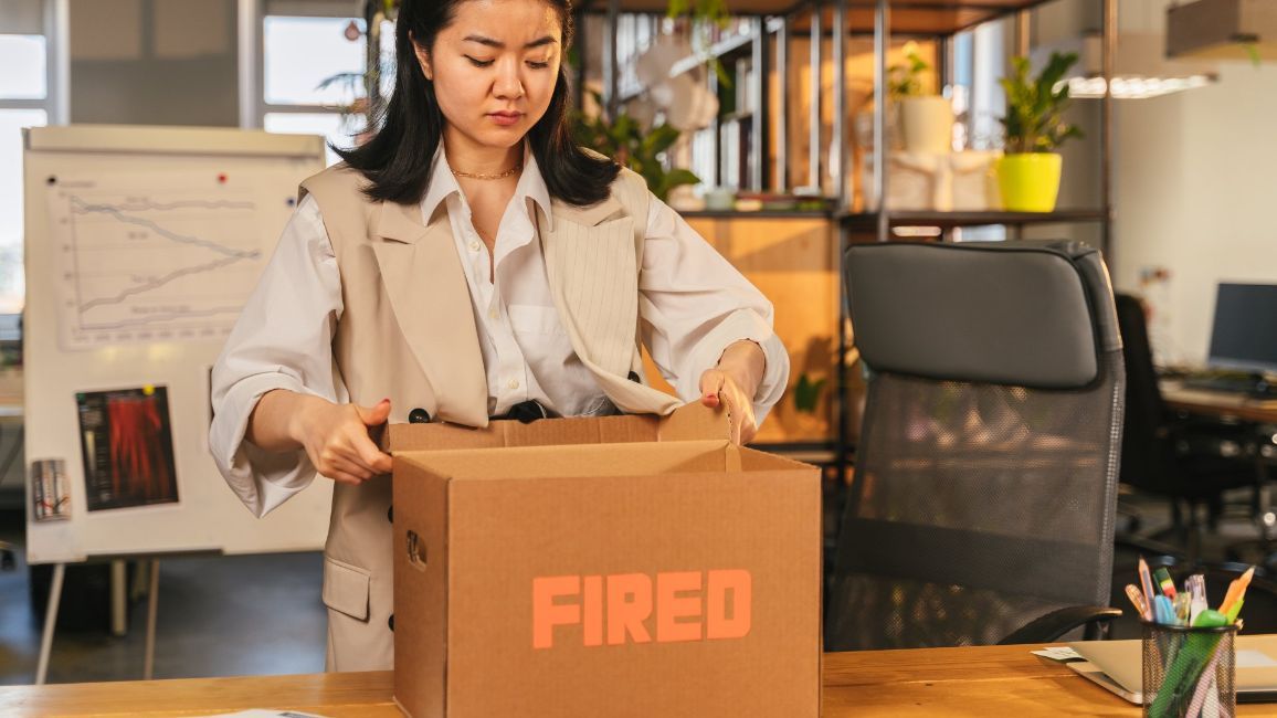 woment packing up office for being fired for pointing out safety concerns