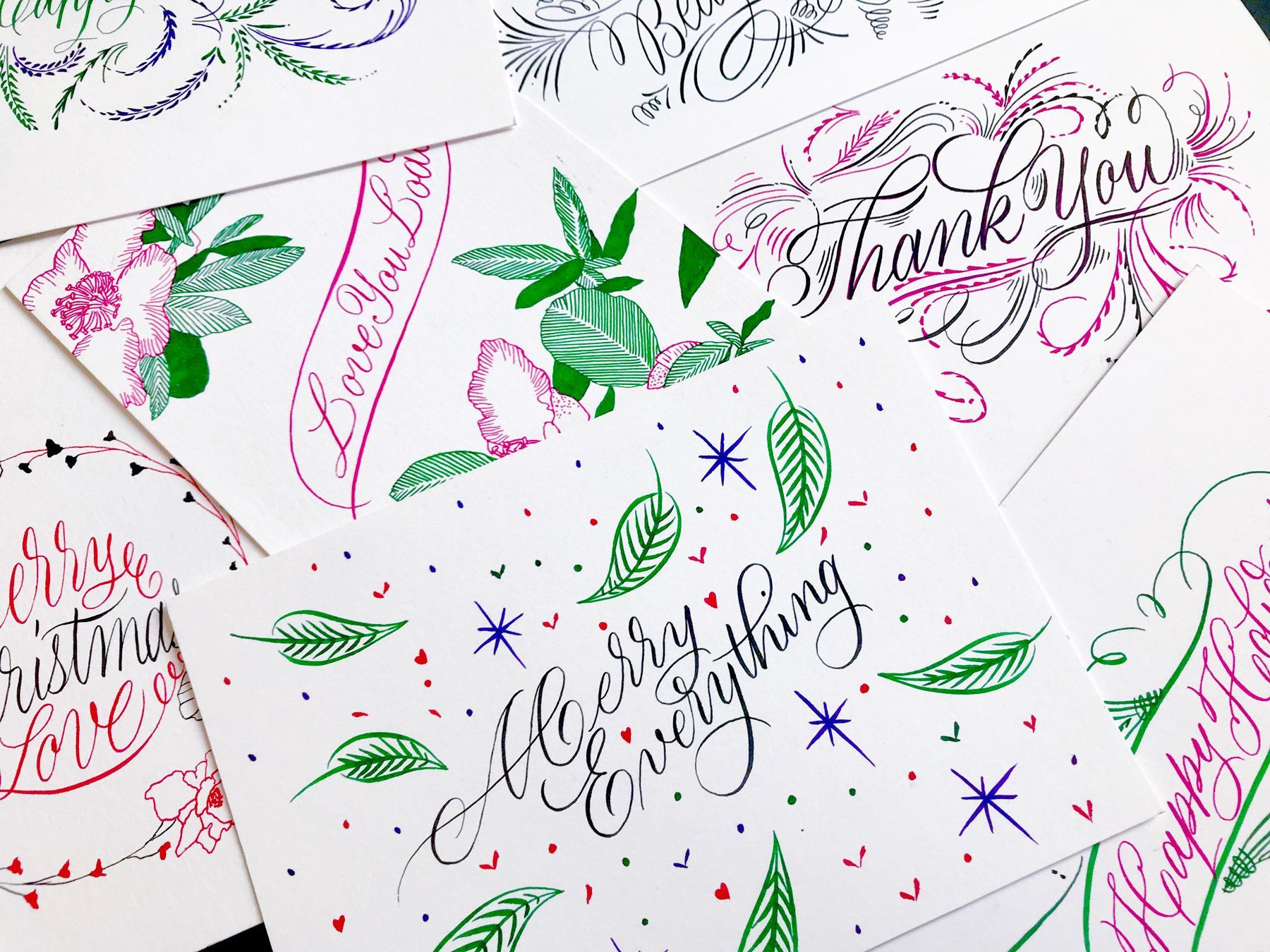 A selection of greeting cards written out in Script Brush Pen calligraphy using a Pentel Touch Sign Brush pens.