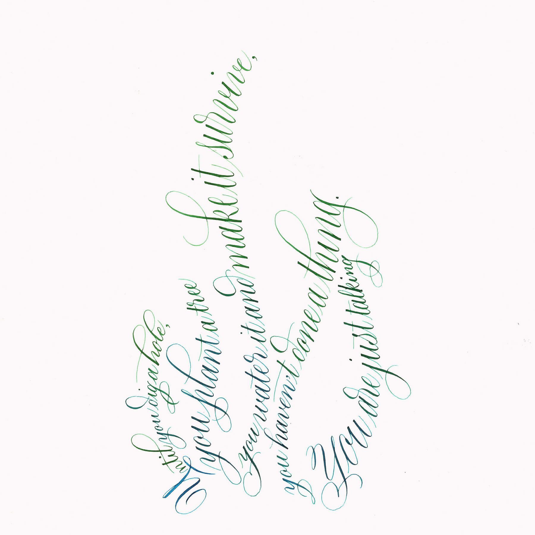 A close-up image of walnut crystals on top of white textured paper from the website www.kalligrafie.com