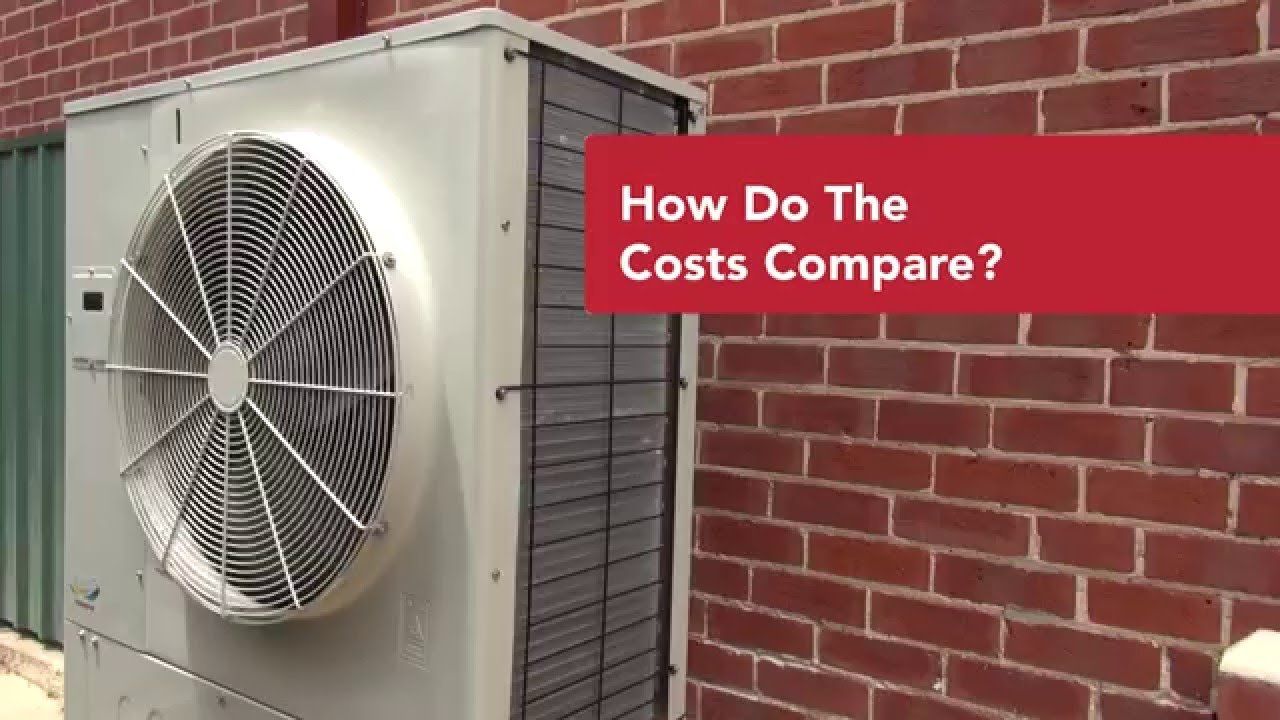 A brick wall with a fan and a sign that says how do the costs compare