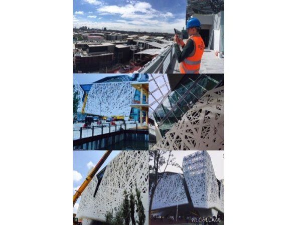 tecnici durante le realizzazioni impiantistiche per l'expo