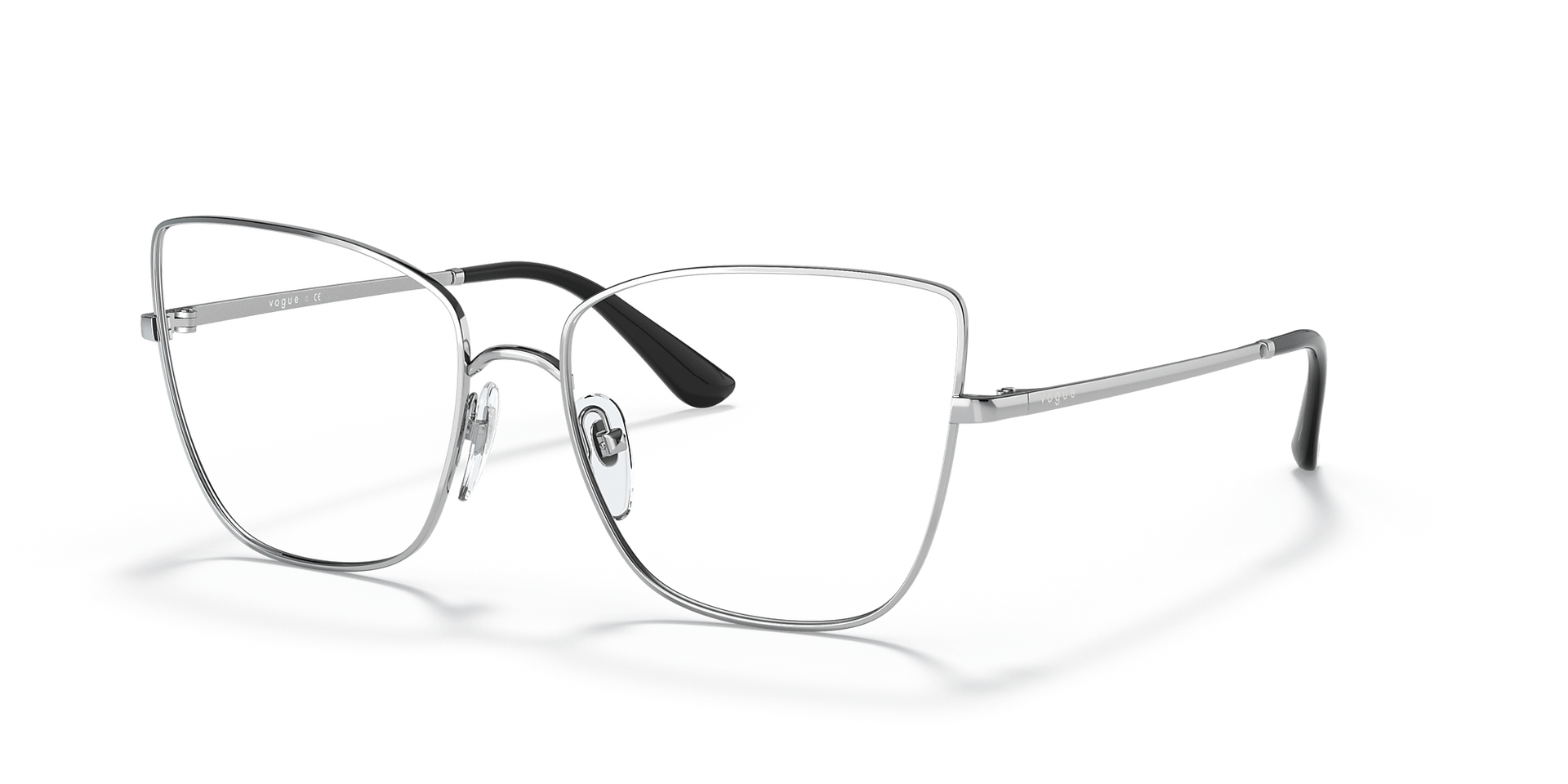 A pair of glasses is sitting on a white surface.